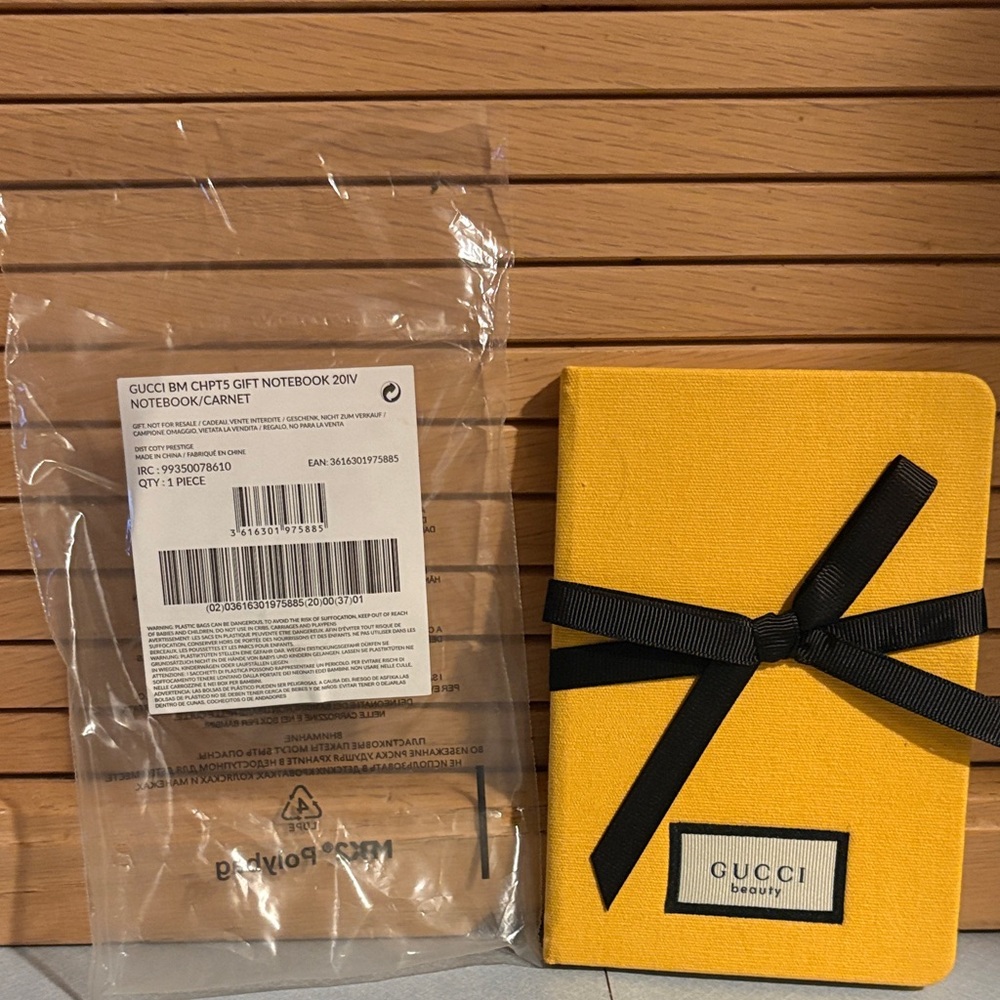 Gucci New Yellow Journal/Notebook with Black Black Bow